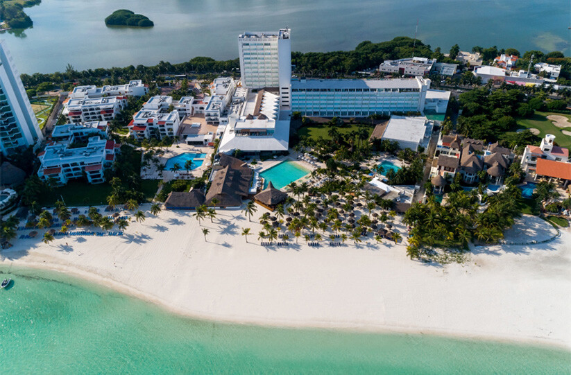 Relájate en un hotel en Cancún con playa, perfecto para unas vacaciones familiares junto al mar